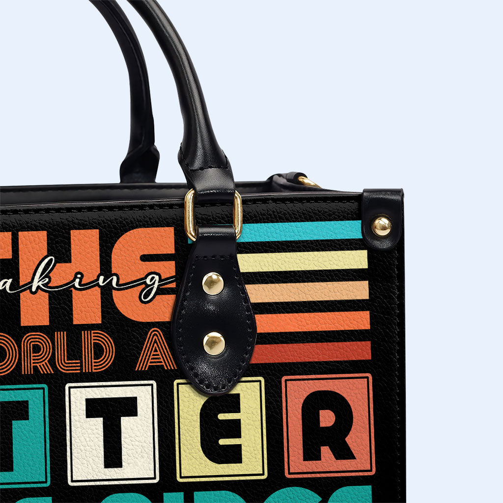 Die Welt zu einem besseren Ort machen – Personalisierte Lederhandtasche – MM17