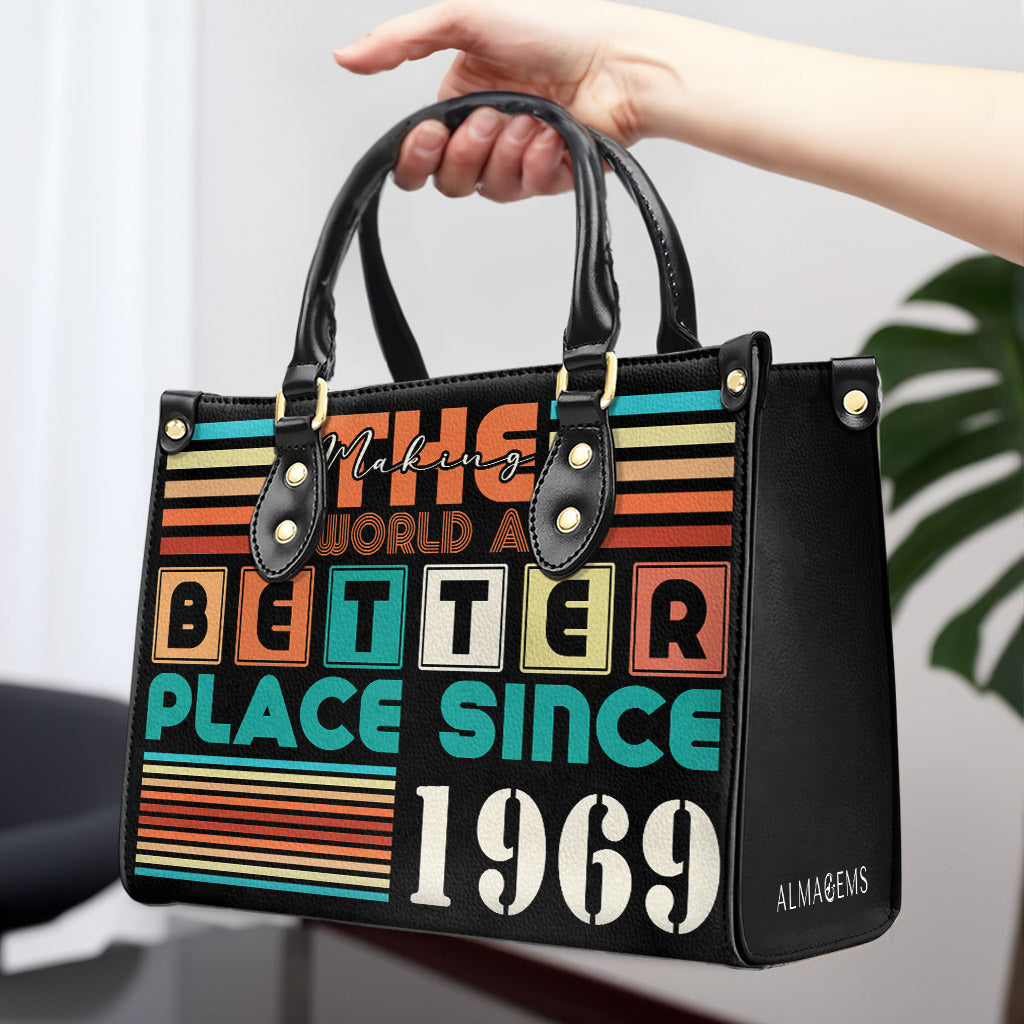 Die Welt zu einem besseren Ort machen – Personalisierte Lederhandtasche – MM17