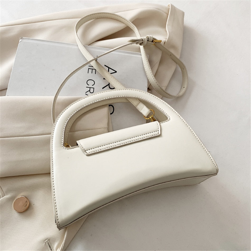 Ruby Clip Handtasche